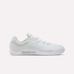 The Reebok Nano Zero Training Shoes are white athletic sneakers with mesh and textured accents, lace-up design, and the Reebok logo on the sole’s side. This zero-drop style is shown in a side profile against a plain background.