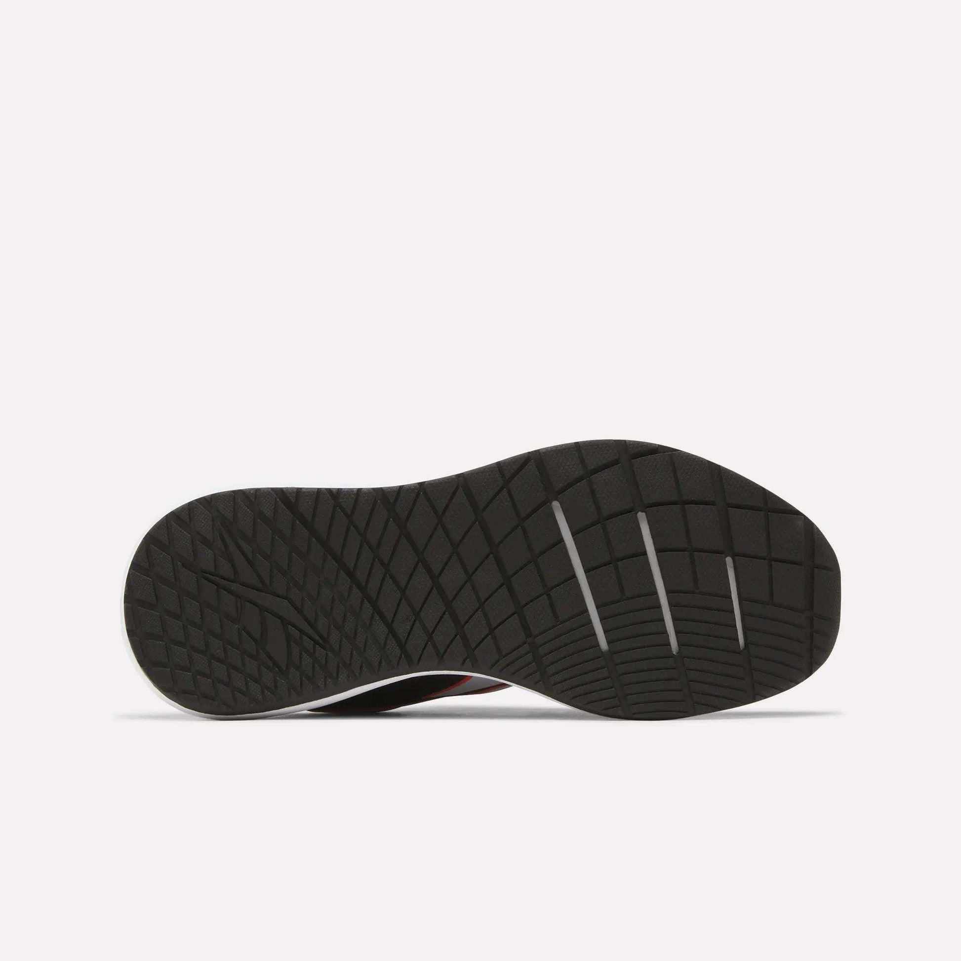 Showcased on a plain white background, the Women's Nanoflex 2.0 Training Shoes by Reebok feature a black sole with a textured diamond-pattern tread and three horizontal grooves near the toe—ideal for stylish and versatile women’s workouts.