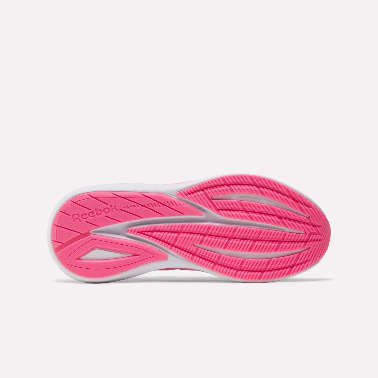The image displays the sole of the Reebok Women's Viva Speed Shoes, featuring a vibrant pink tread pattern with the Reebok logo. Curved grooves provide traction, while a white border outlines the edges—highlighting the attention to detail often seen in cushioned running shoes.
