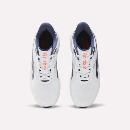 A pair of Men's Viva Speed Shoes by Reebok in white with navy and orange accents, shown from above on a light background. Designed for breathability and cushioned support, these shoes are ideal for running and everyday comfort.