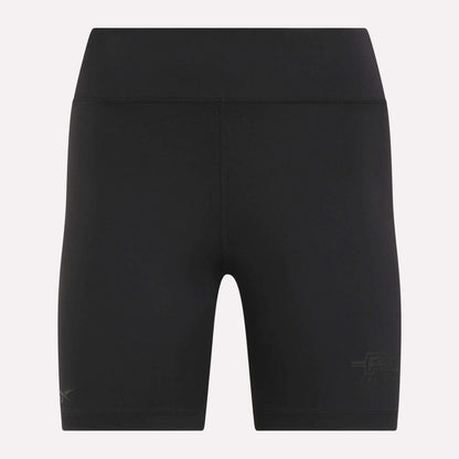 Women's Reebok x F45 Training High-Rise Biker Shorts, featuring a black, fitted design with subtle Reebok branding near the lower legs. Shown against a plain light background, these high-waisted shorts are crafted for performance without visible pockets or drawstrings—ideal for F45 Training and other high-intensity workouts.