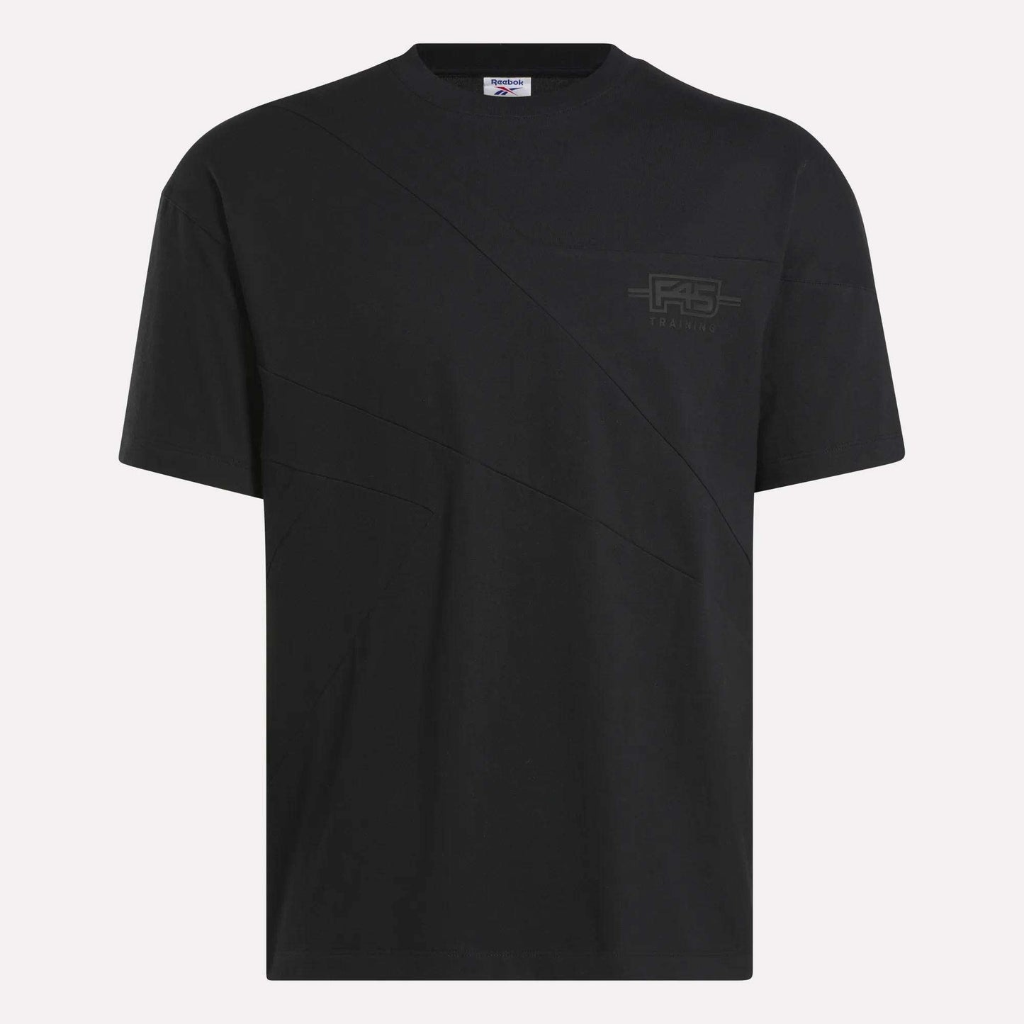 The Reebok x F45 Training Relaxed T-Shirt is a plain black tee with a subtle diagonal seam and small RS logo on the chest, featuring a crew neck and relaxed fit—ideal for workouts or F45 Training sessions.
