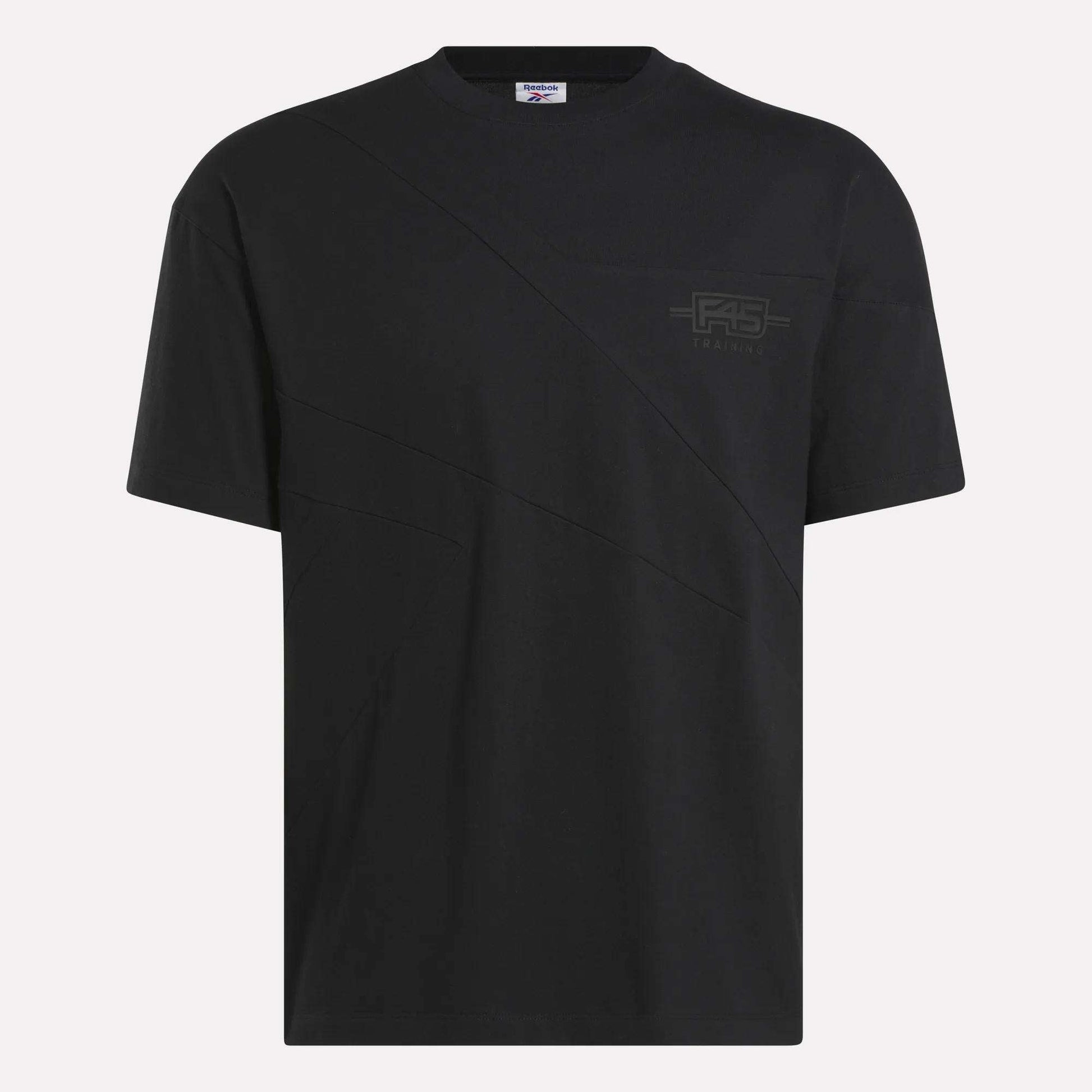 The Reebok x F45 Training Relaxed T-Shirt is a plain black tee with a subtle diagonal seam and small RS logo on the chest, featuring a crew neck and relaxed fit—ideal for workouts or F45 Training sessions.