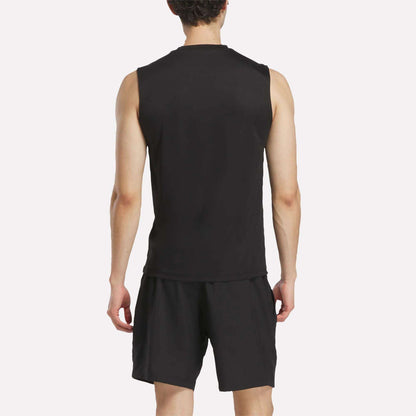 A person wearing a Men's Reebok x F45 Training Tank Top and black shorts stands facing away, displaying the back of their outfit against a plain white background—ideal attire for high-intensity workouts or F45 Training sessions.