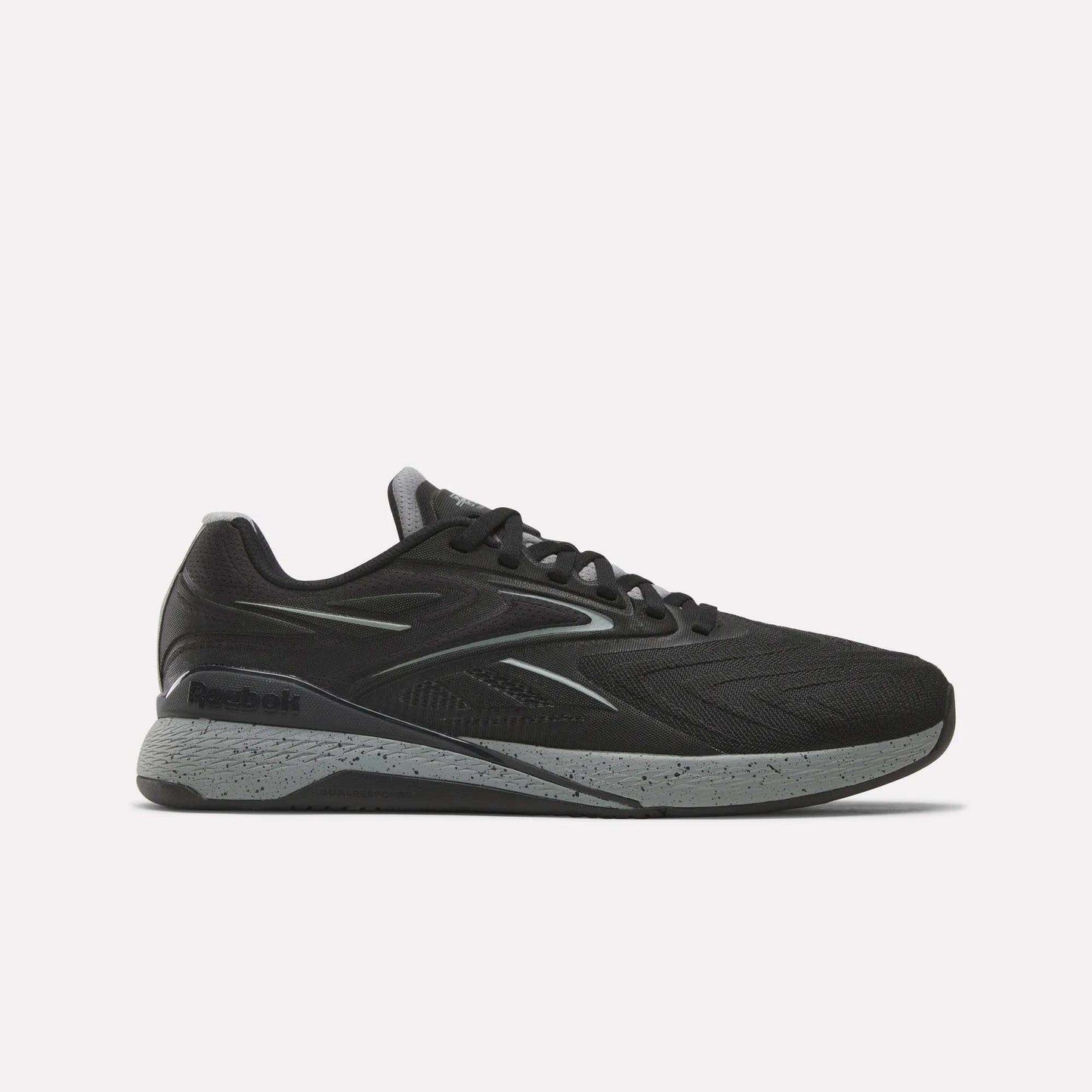 The Reebok x F45 Nano X5 Edge, a black performance training sneaker with a gray speckled sole, is displayed in side profile against a plain white background.