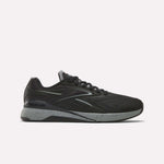 The Reebok x F45 Nano X5 Edge, a black performance training sneaker with a gray speckled sole, is displayed in side profile against a plain white background.