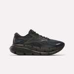 Men's FloatZig Double Running Shoes by Reebok in Black/Black/Grey, featuring a mesh upper, signature side stripes, and a thick segmented cushioned sole for maximum comfort—shown on a plain white background.