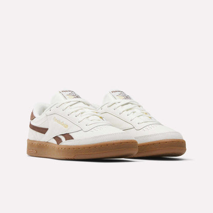 A pair of Reebok Men's Club C Revenge Vintage Shoes in white leather with brown accents and a gum sole, shown on a plain white background. The design features the Reebok logo on the side and tongue.