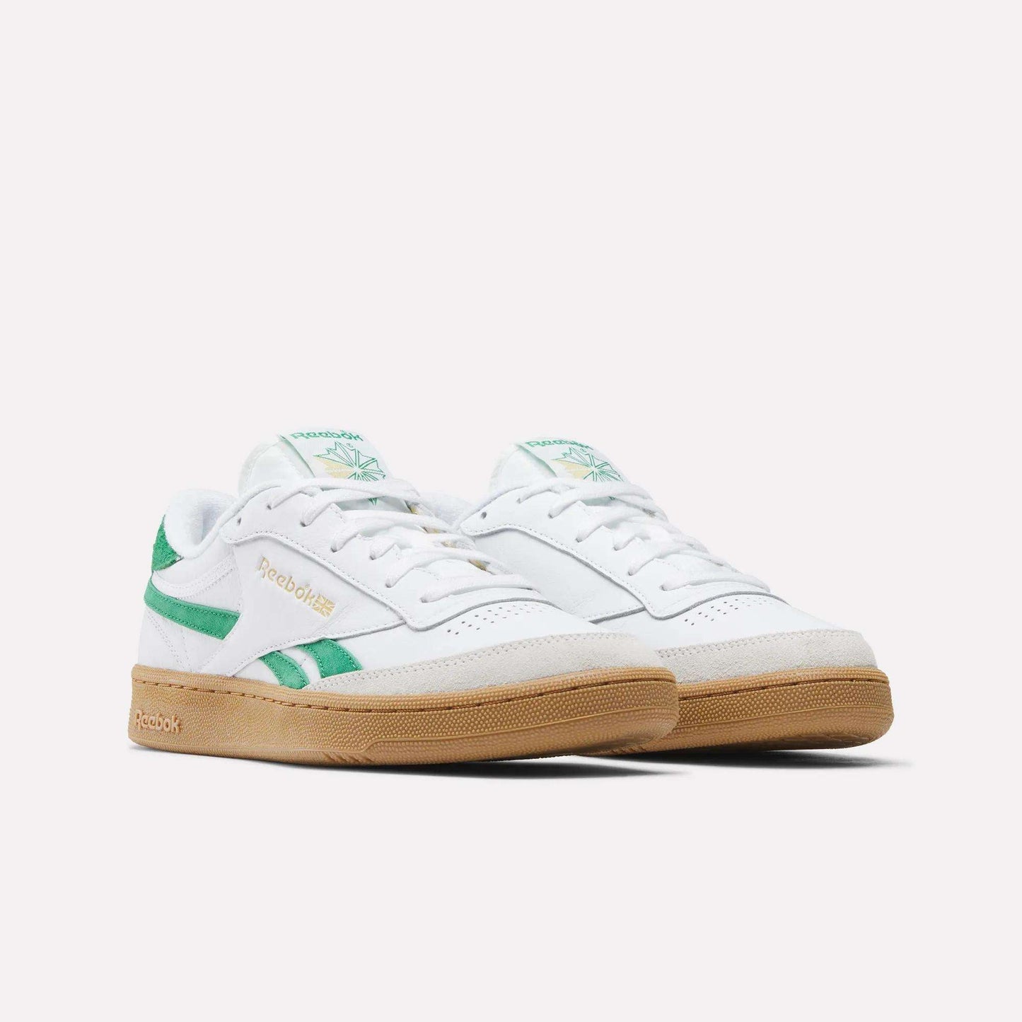 A pair of Reebok Men's Club C Revenge Vintage Shoes in white leather with green accents and a gum sole, shown on a plain white background. The heritage Reebok logo appears on the side and tongue.
