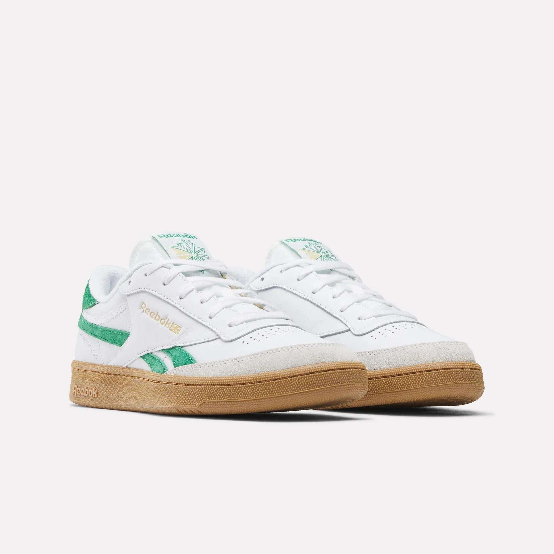 A pair of Reebok Men's Club C Revenge Vintage Shoes in white leather with green accents and a gum sole, shown on a plain white background. The heritage Reebok logo appears on the side and tongue.