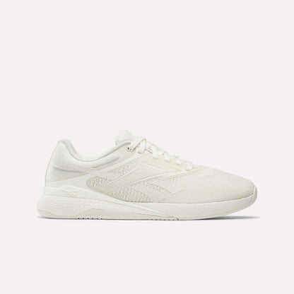 A side view of Reebok Nano X5 Women's Training Shoes in white, featuring a textured mesh design, lace-up closure, and slightly elevated sole, displayed against a plain white background.
