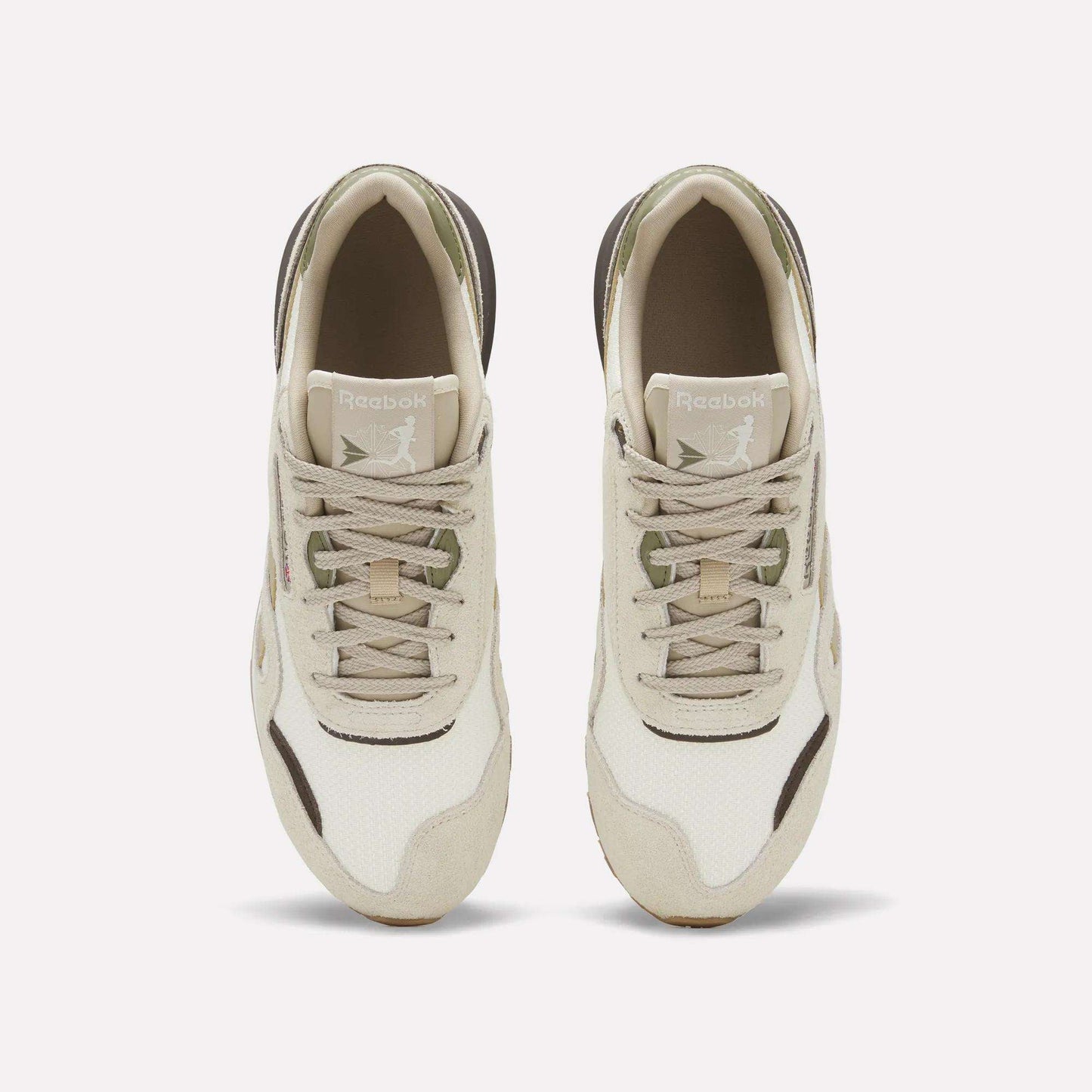 Top view of Reebok Men's Classic Nylon 89 Shoes with a beige and white suede upper, light brown and olive green accents, shown side by side on a plain white background.