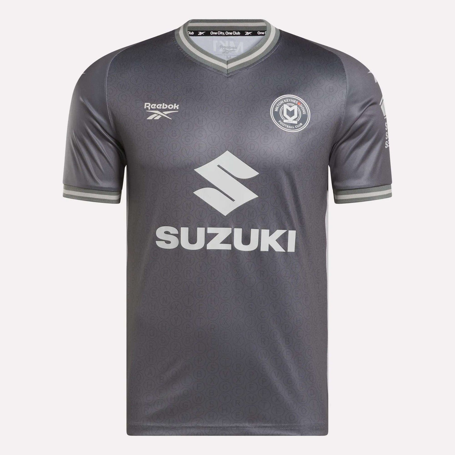 The Men's MK Dons Away Jersey by Reebok features a subtle gray pattern, a circular team crest on the chest, and SUZUKI across the front—a stylish soccer jersey inspired by Bletchley Park heritage.