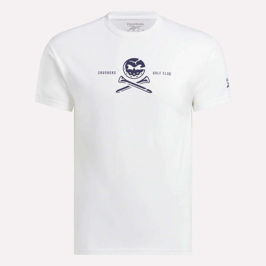 The Men's Crushers Tee by Reebok is a white shirt featuring a navy pumpkin graphic above crossed golf clubs and the text "CRUSHERS GOLF CLUB," inspired by Bryson DeChambeau's passion for the Crushers.