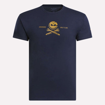 The Men's Crushers Tee by Reebok features a yellow pumpkin skull over crossed golf clubs with "Crushers Golf Club" text, offering a bold navy blue style inspired by Bryson DeChambeau.
