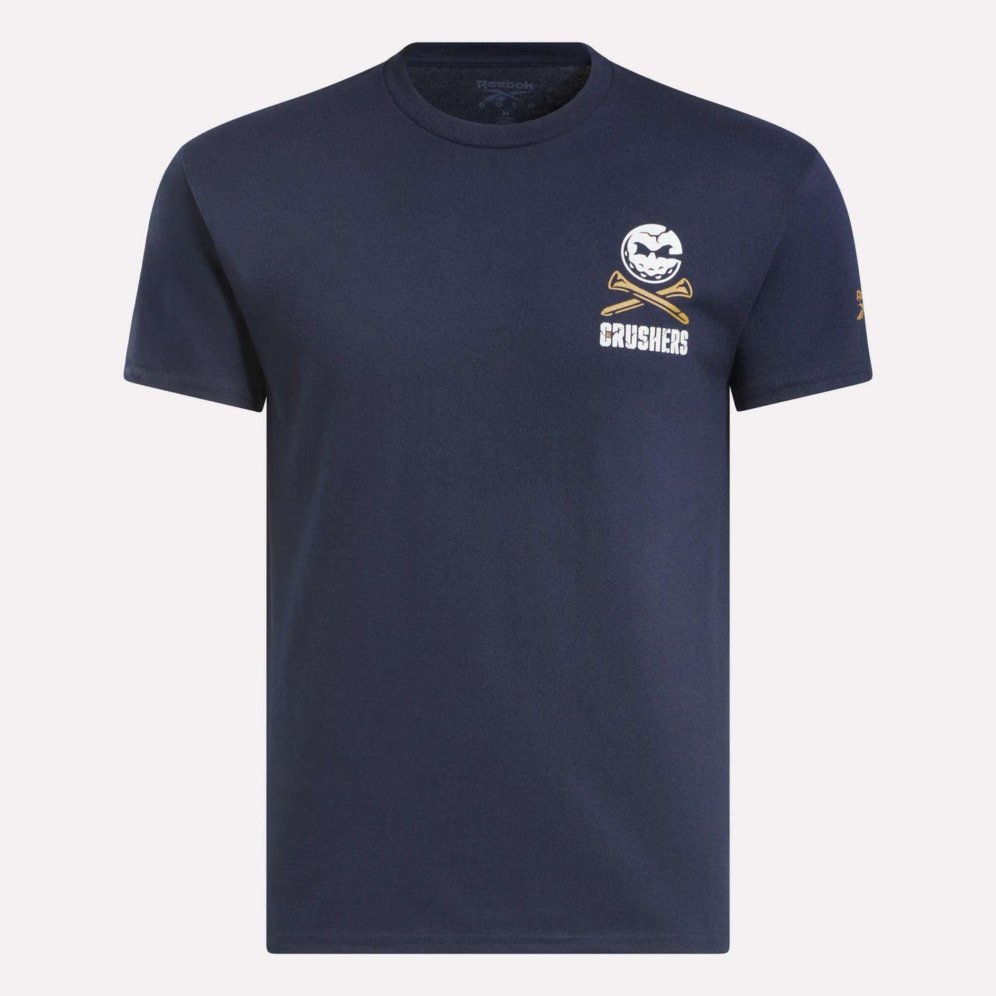 The Men's Crushers Stacked Logo Tee by Reebok is a navy short-sleeve shirt featuring a small white baseball and crossed bats graphic above “CRUSHERS” on the left chest, inspired by Bryson DeChambeau’s team spirit.