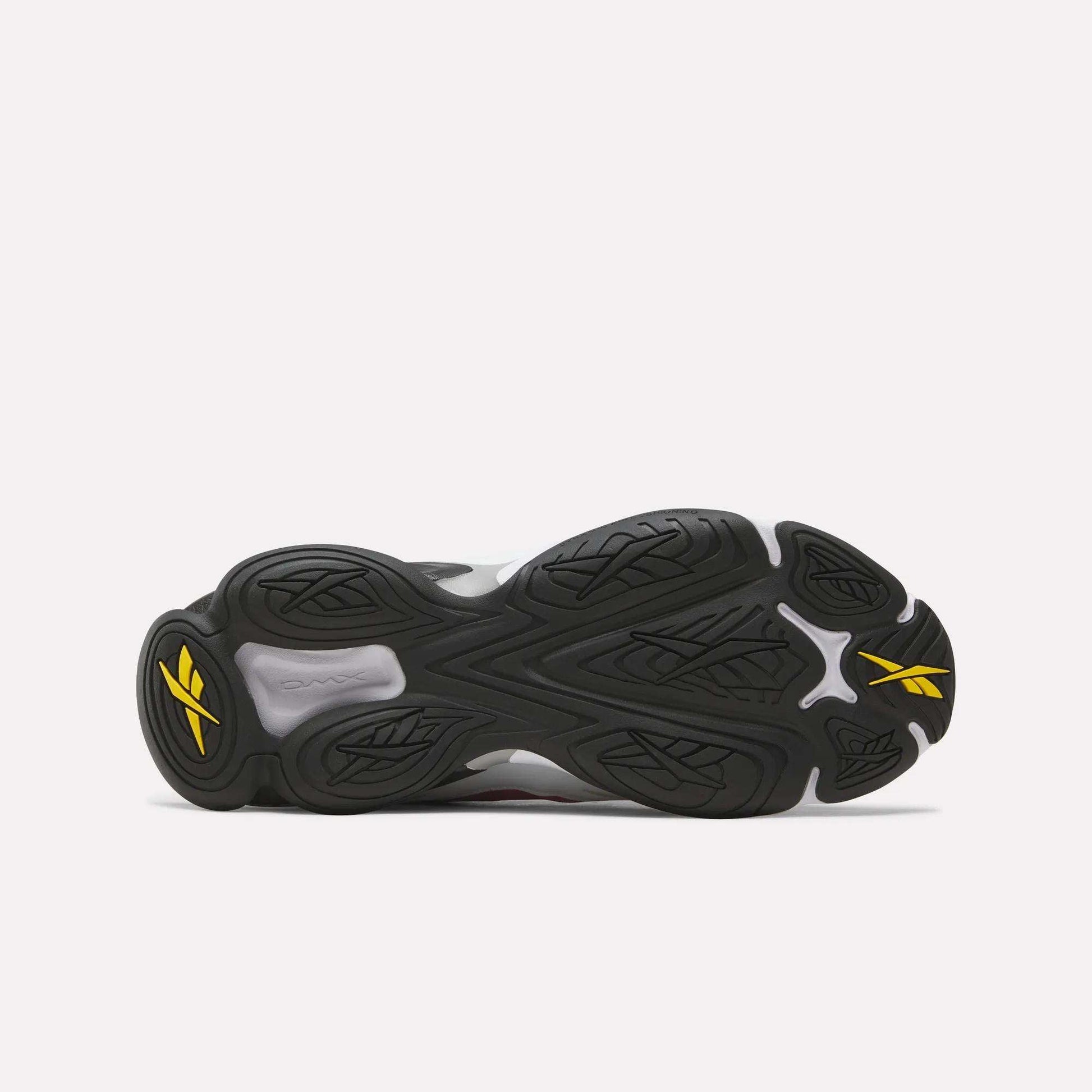Black and yellow athletic shoe sole on a white background