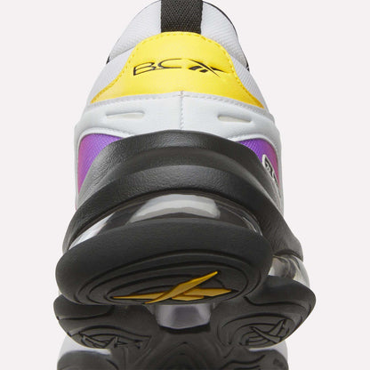 Close-up of a colorful sneaker with a prominent sole on a white background