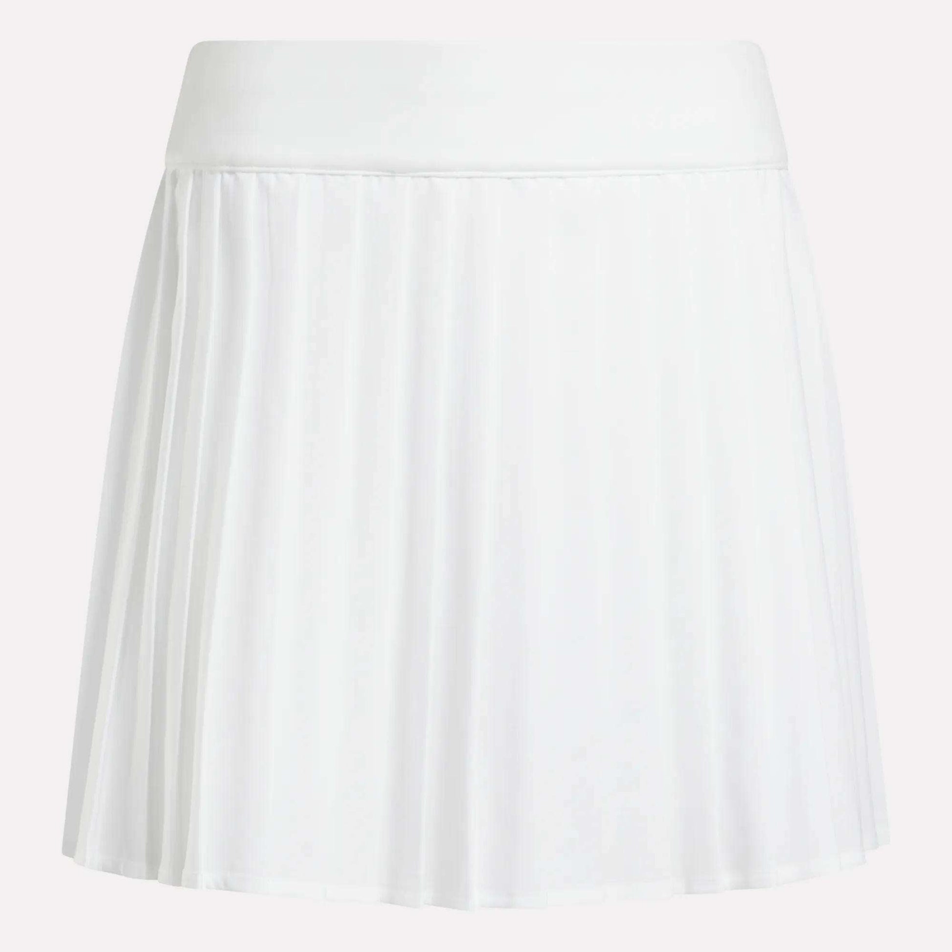 The Reebok Women's Pleated Skort is a white mini skort with a wide waistband, made from UPF-rated RBK-DRY fabric, shown against a plain background.