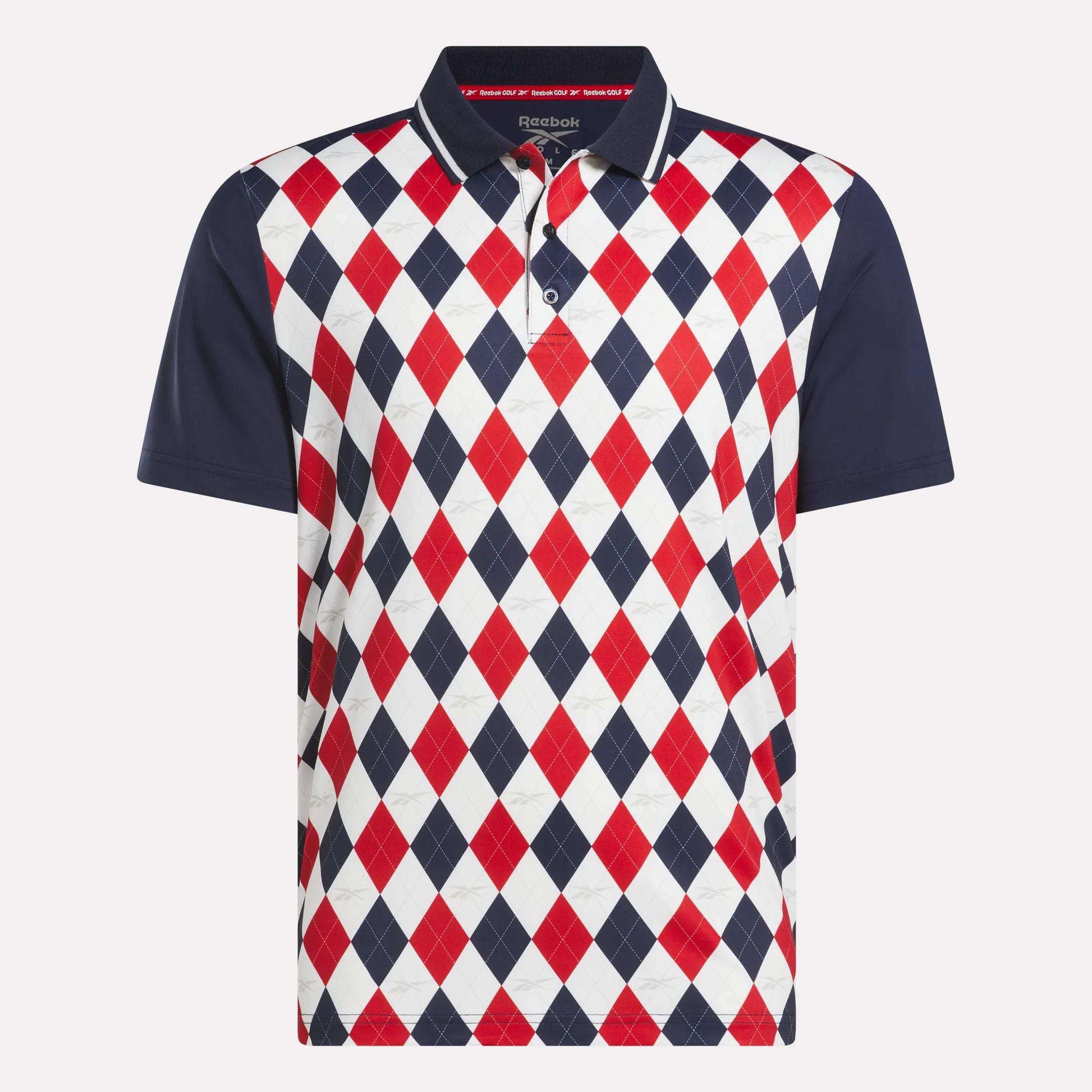 The Reebok Men's Vector Argyle Print Polo features a navy collar and sleeves, stretch knit fabric, a bold red, navy, and white argyle front pattern, button placket, and Reebok logo inside the collar.