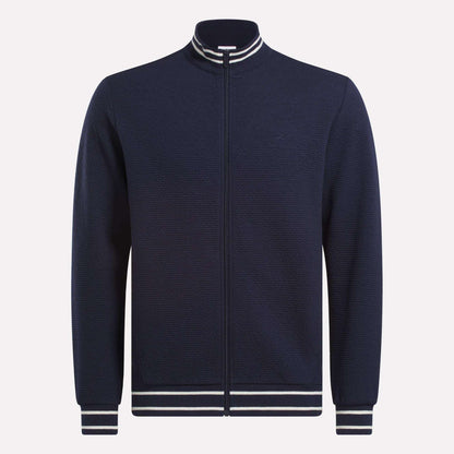 The Reebok Men's Club Sport Textured Jacket is a navy zip-up with thermal knit fabric and white/navy striped ribbed collar, cuffs, and hem, shown on a plain white background.
