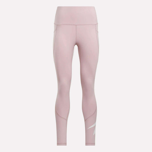 Reebok Women's High-Rise Tights 26" in light pink, featuring subtle seam details and a white logo on the lower left leg, displayed on a plain white background.