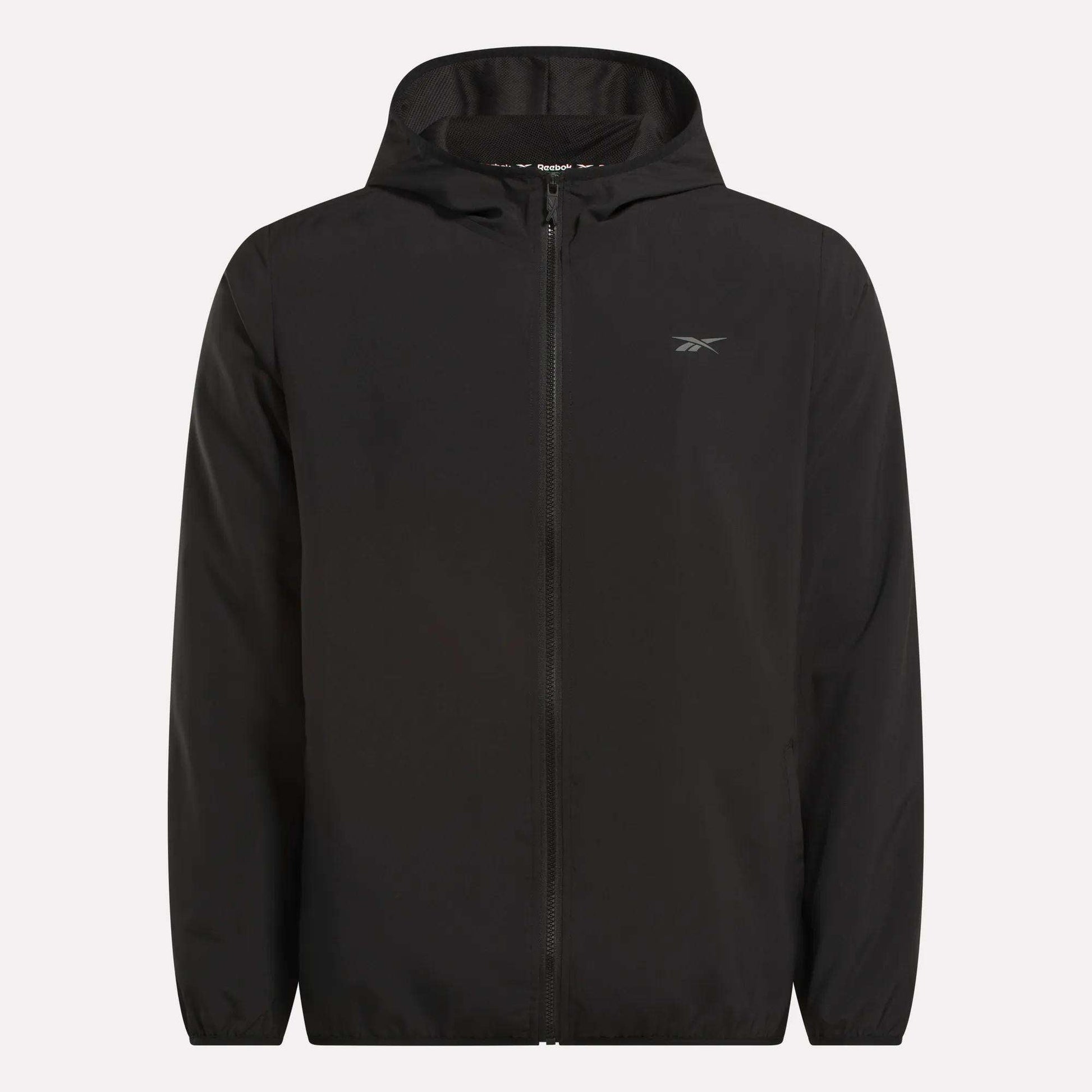 The Reebok Men's Woven Jacket features a plain black zip-up hooded design, long sleeves, relaxed fit, lightweight woven fabric, and a small logo on the left chest.