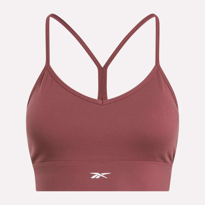 The Reebok Women's Back Bra is a maroon medium-impact sports bra with thin racerback straps and a white front center logo, shown on a plain white background.