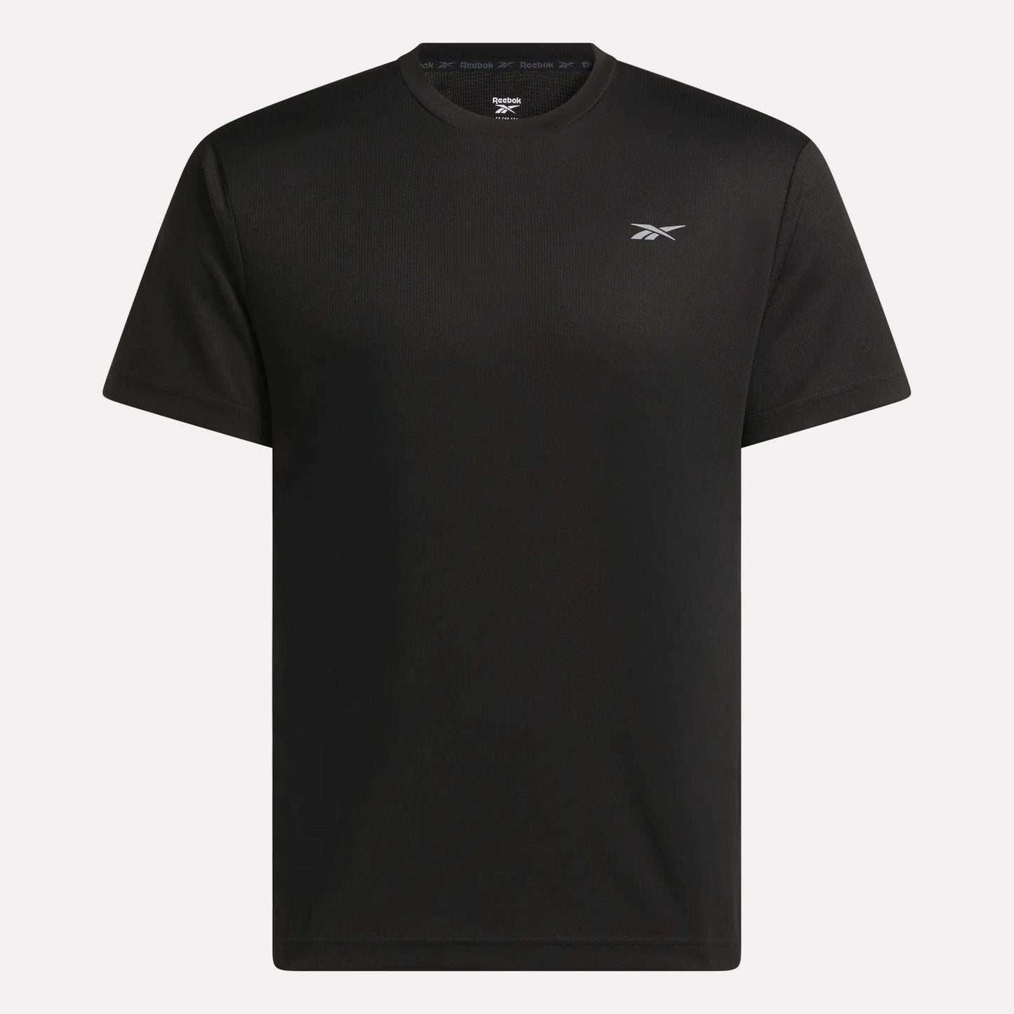 The Men's Director Short Sleeve Top by Reebok is a plain black, stretchy workout t-shirt with short sleeves and a small white Reebok logo on the left chest, shown against a white background.