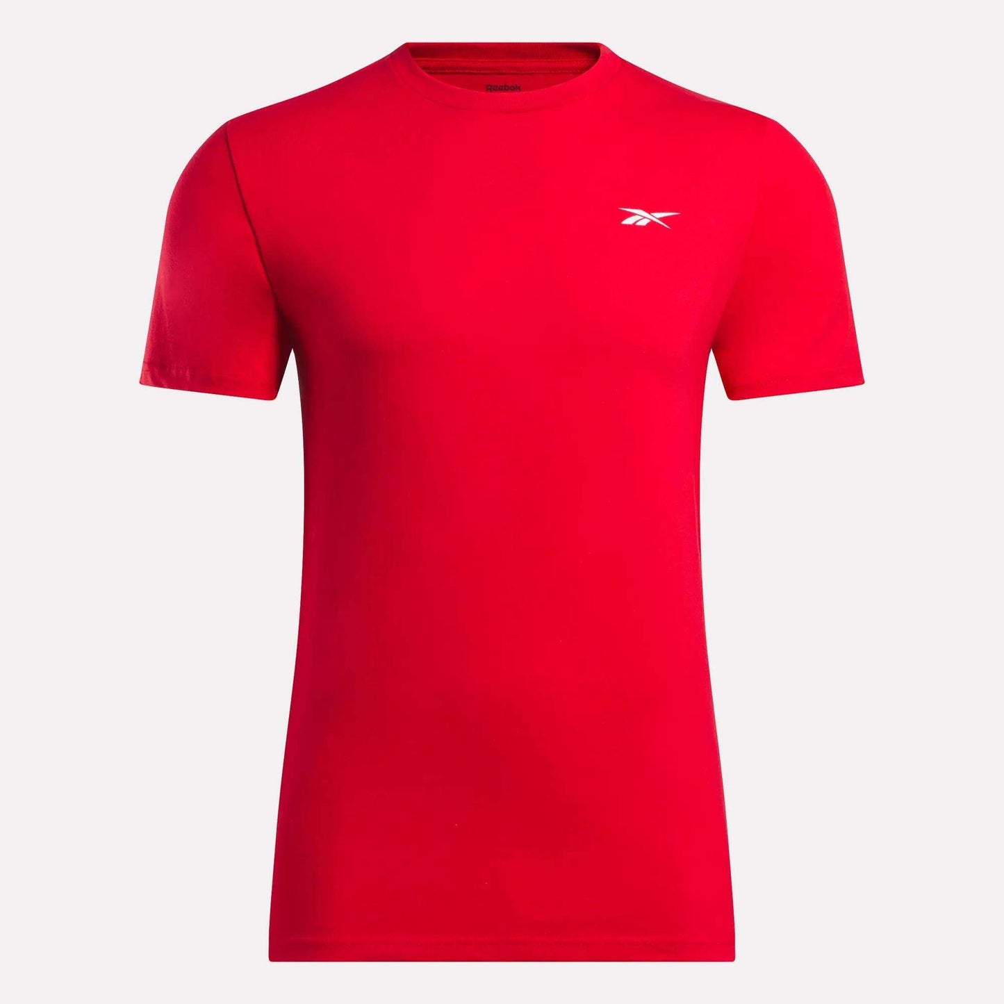 The Reebok Men's Small Logo T-Shirt is a plain red relaxed fit tee with a small white logo on the left chest, shown on a white background.