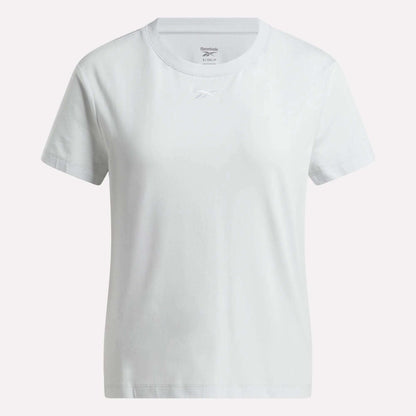 The Women's Graphic Glow Top by Reebok is shown against a light background, featuring a soft feel, classic crew neck, and subtle chest logo for timeless comfort and style.