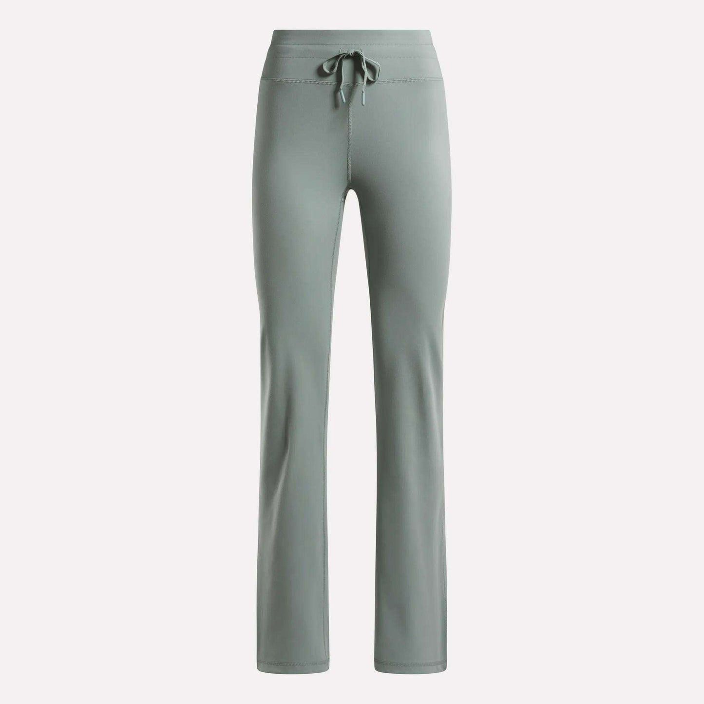 The Reebok Women's Highstreet High-Rise Pants in light sage green feature a drawstring waistband, straight legs, and stretchy fabric for comfort—ideal lounge wear, shown on a plain white background.