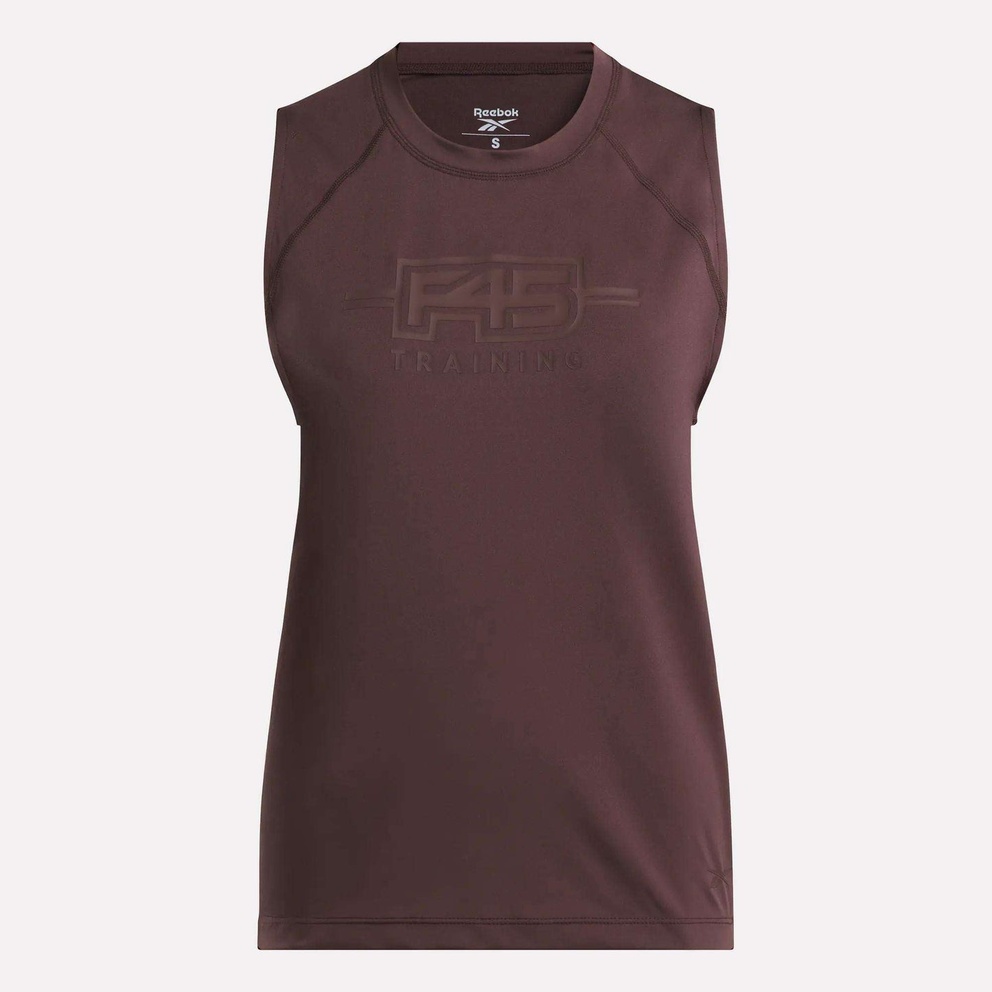 Introducing the Women's Reebok x F45 Training Tank Top—a sleeveless maroon athletic piece featuring "F45 TRAINING" embossed on the front chest. Crafted from premium, sweat-wicking materials, this tank top keeps you cool and comfortable throughout your workouts. The simple, fitted design is complemented by a Reebok logo on the inside neck label, showcasing authentic Reebok performance.