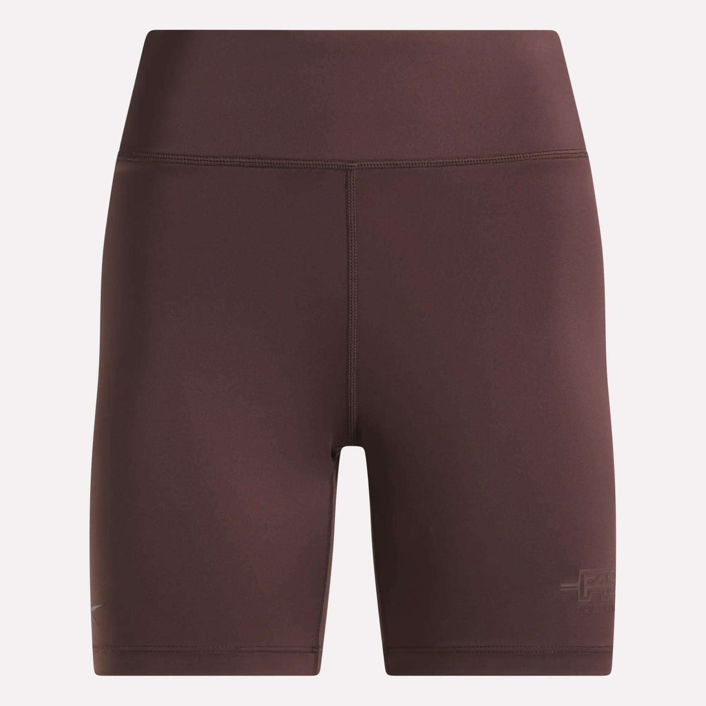 Women's Reebok x F45 Training High-Rise Biker Shorts in Dark Cocoa feature a smooth finish, visible seams, and a subtle Reebok logo on the left thigh. Perfect for your next F45 Training session, these high-waisted shorts are showcased against a plain background.