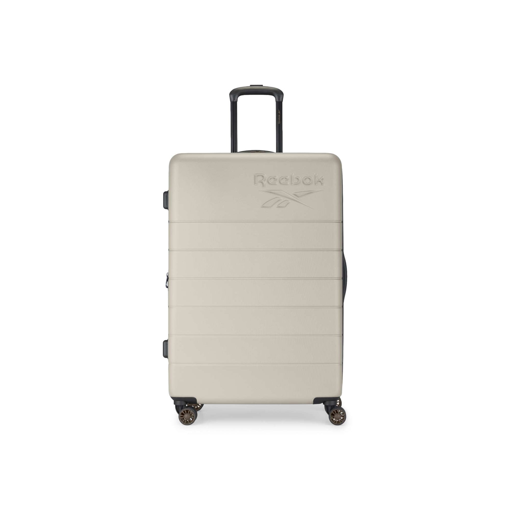 A beige Reebok Captain 2 Piece Luggage Set hard-shell suitcase, featuring four spinner wheels, a black telescopic handle, and an embossed logo on the front, stands upright against a white background.