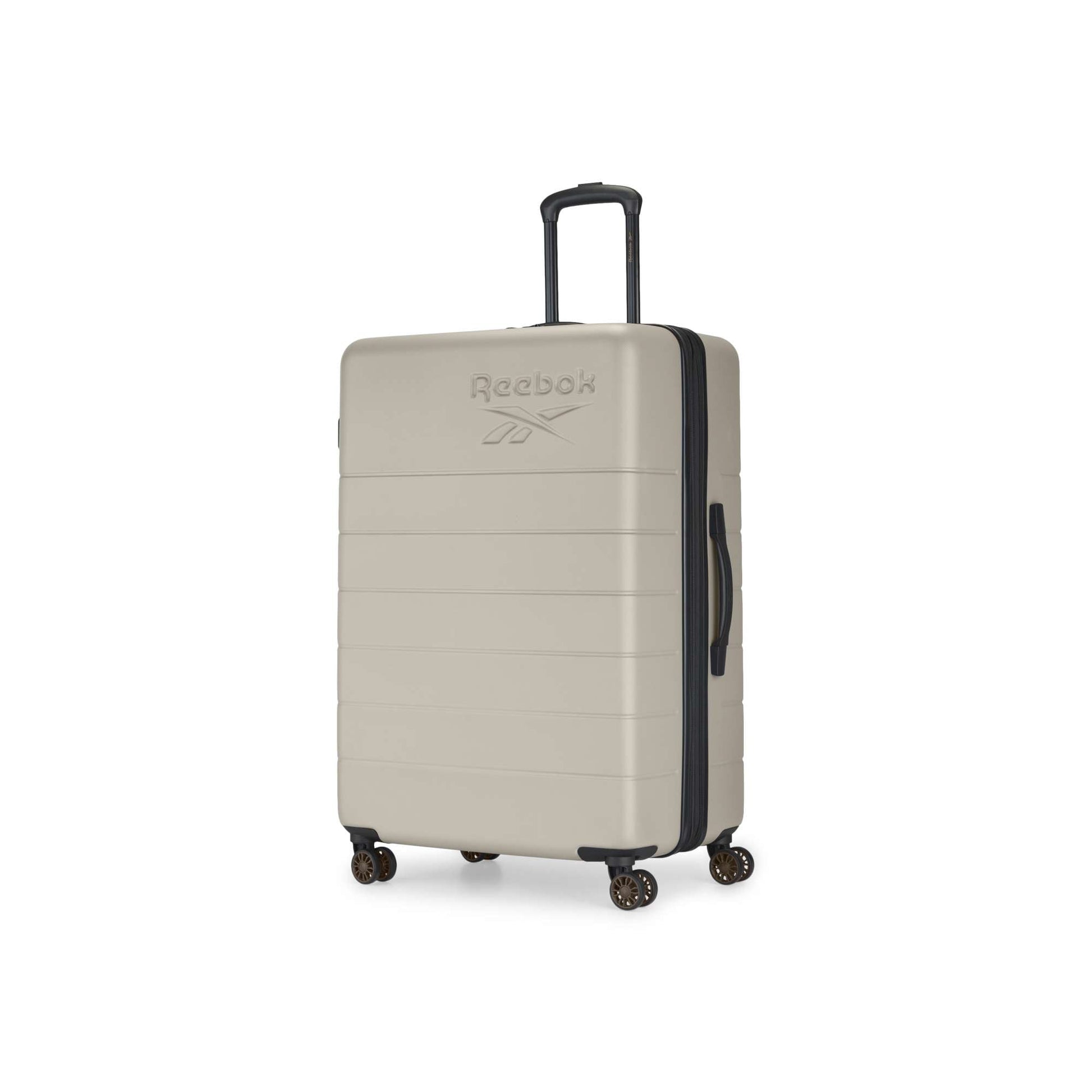 The Reebok Captain 2 Piece Luggage Set features a beige hard-shell case with four spinner wheels, retractable and side handles, and an embossed Reebok logo. This durable luggage stands upright against a white background.