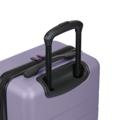 A close-up of the Reebok Captain 2 Piece Luggage Set shows its purple hard-shell design, black telescopic handle, purple zipper pull, and smooth spinner wheels—ideal durable luggage for all your travels.
