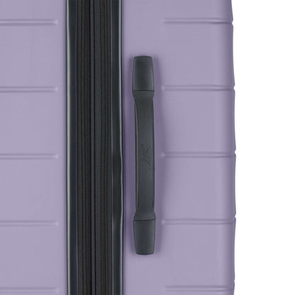 A close-up of the Reebok Captain 2 Piece Luggage Set shows its purple hard shell, black zipper and side handle, and smooth spinner wheels—blending durability with style.