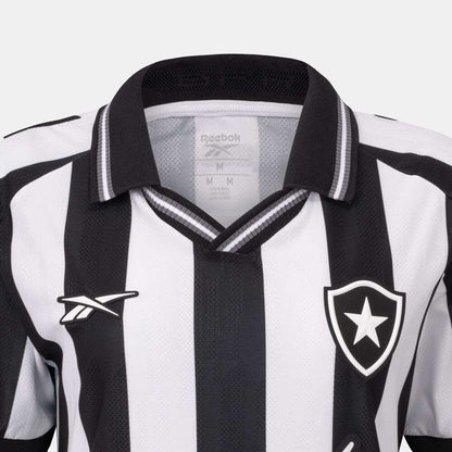Close-up of the Botafogo Women's Home Jersey by Reebok, featuring black and white stripes, a star inside a shield on the left chest, and a black collar—perfect for the 25/26 football season.
