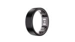 A sleek, black Reebok Smart Ring by Reebok stands upright against a plain white background, displaying small sensors and electronic components inside for biometric data tracking.
