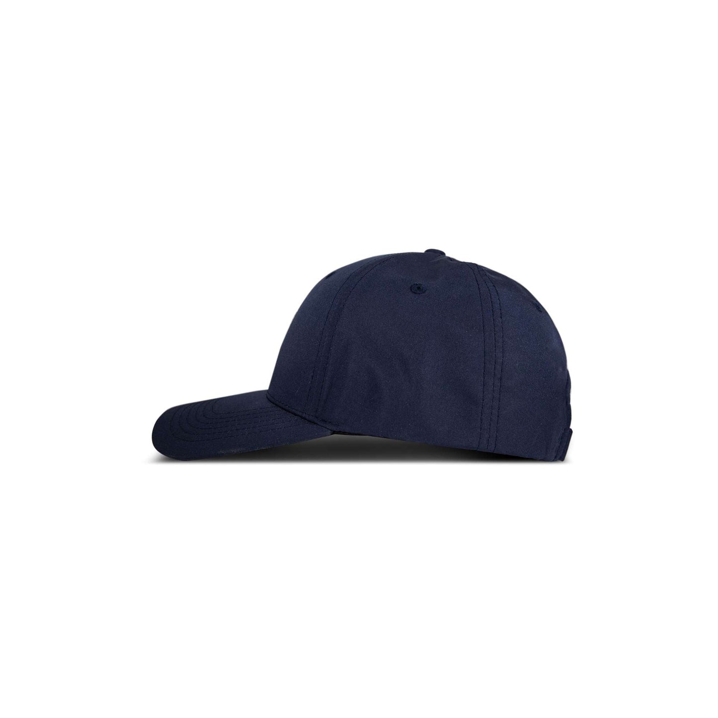 A side view of the Reebok 1895 Pro, a plain navy blue baseball cap, is displayed against a white background.
