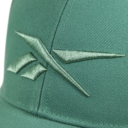 Close-up of a green Reebok Vector Baseball Cap with an embroidered green logo on the front and an adjustable snapback closure for a perfect fit.