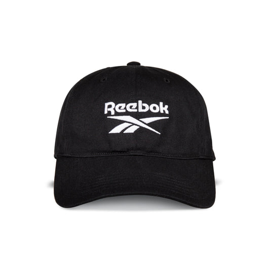 The Reebok Logo Cap is a black cotton twill cap with the Reebok logo and name embroidered in white on the front panel, featuring an adjustable buckle closure for comfort.