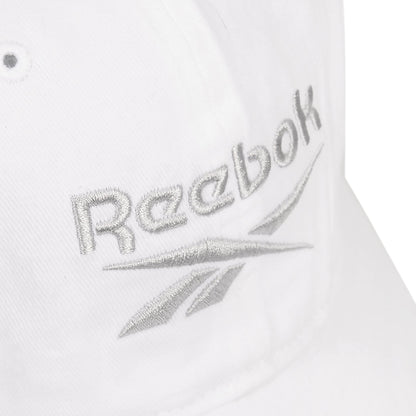 Close-up of the Reebok Logo Cap, crafted from cotton twill with silver embroidered text on the front and an adjustable buckle closure for a perfect fit.