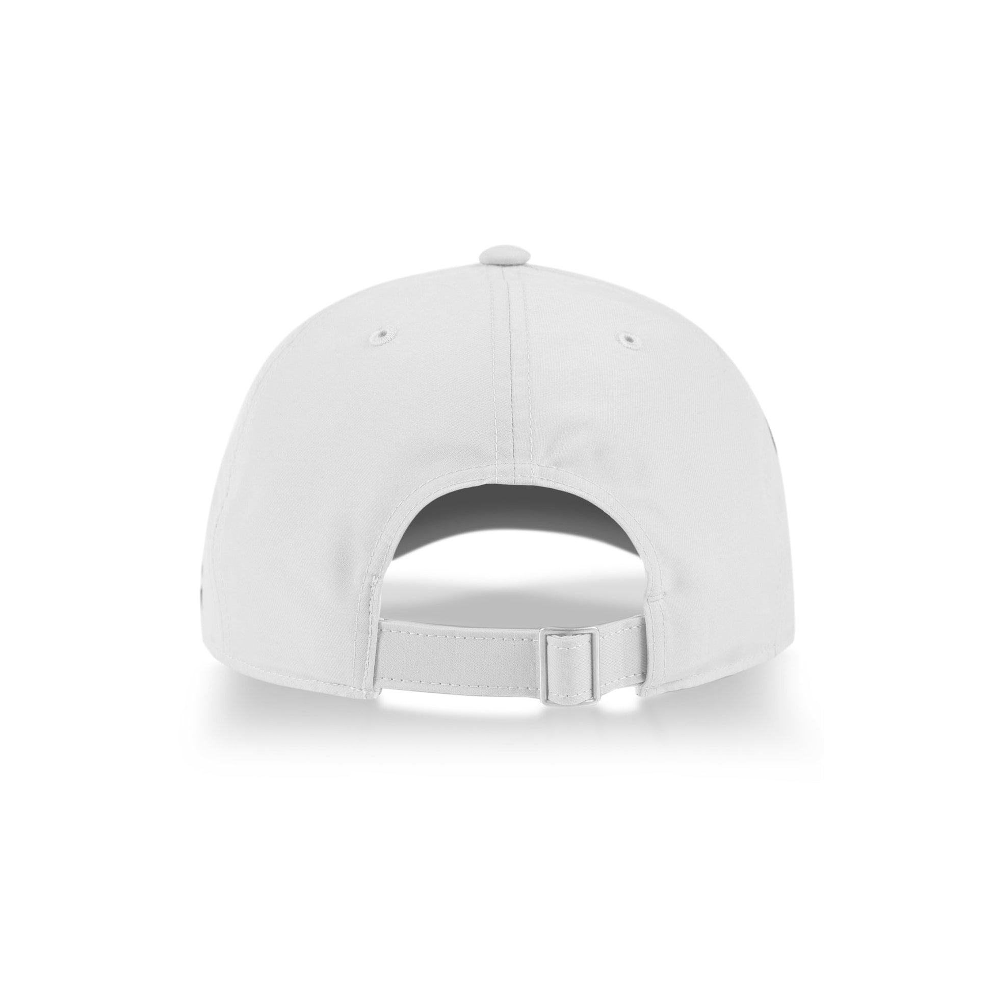 A Reebok Badge Cap in white is shown from the back, highlighting its adjustable strap and curved rear opening. The sports cap rests on a white surface with a subtle shadow below.