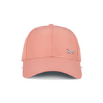 The Reebok Badge Cap is pink with a curved brim, moisture-wicking fabric, a small silver logo on the front left, and an adjustable buckle for a perfect fit—all shown on a white background.