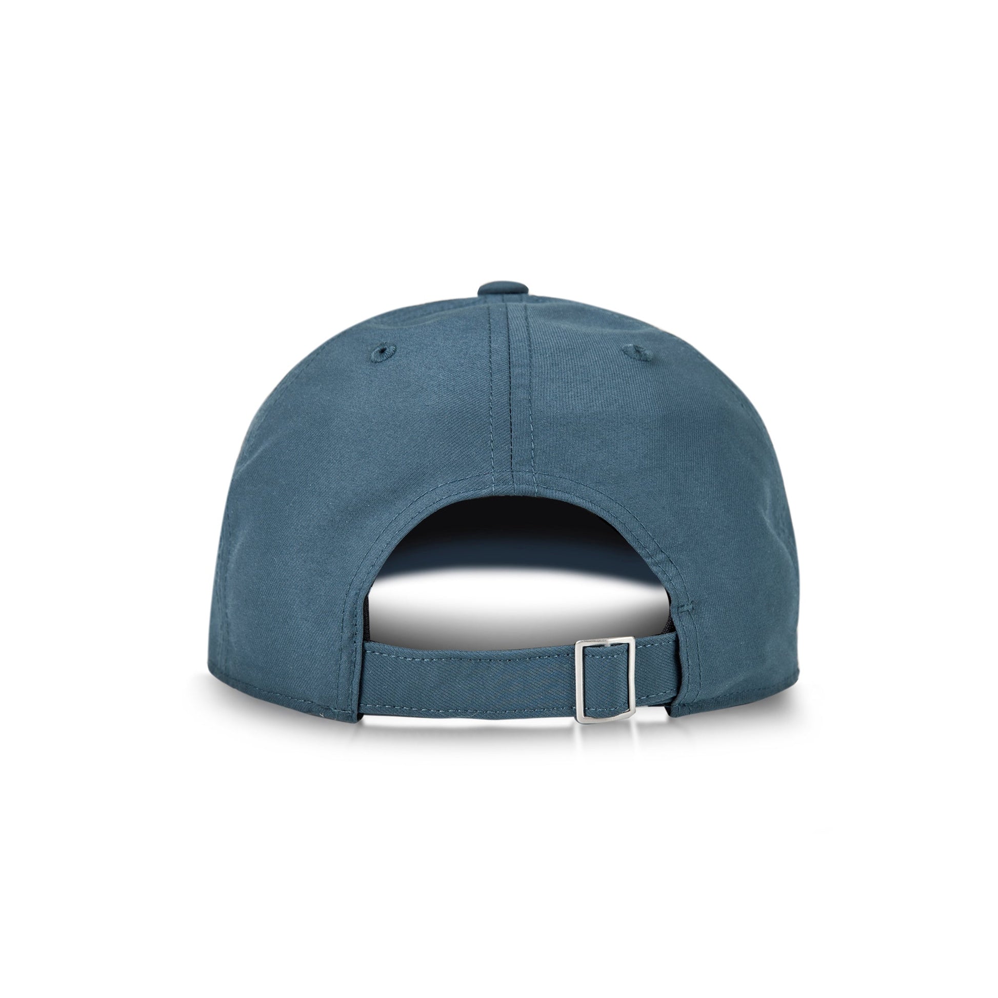 A teal Reebok Badge Cap shown from the back with an adjustable strap, metal buckle, and opening above the strap. This Reebok sports hat offers a comfortable, custom fit.