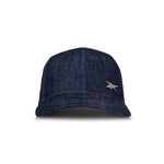 The Reebok Denim Badge Cap is a dark blue premium denim hat featuring visible stitching, a small silver logo on the lower right front, and a Speedwick sweatband, shown against a white background.