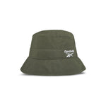 The Reebok Bucket Hat in olive green, crafted from recycled nylon, features a wide brim and white logo for standout streetwear style. Shown against a plain white background.