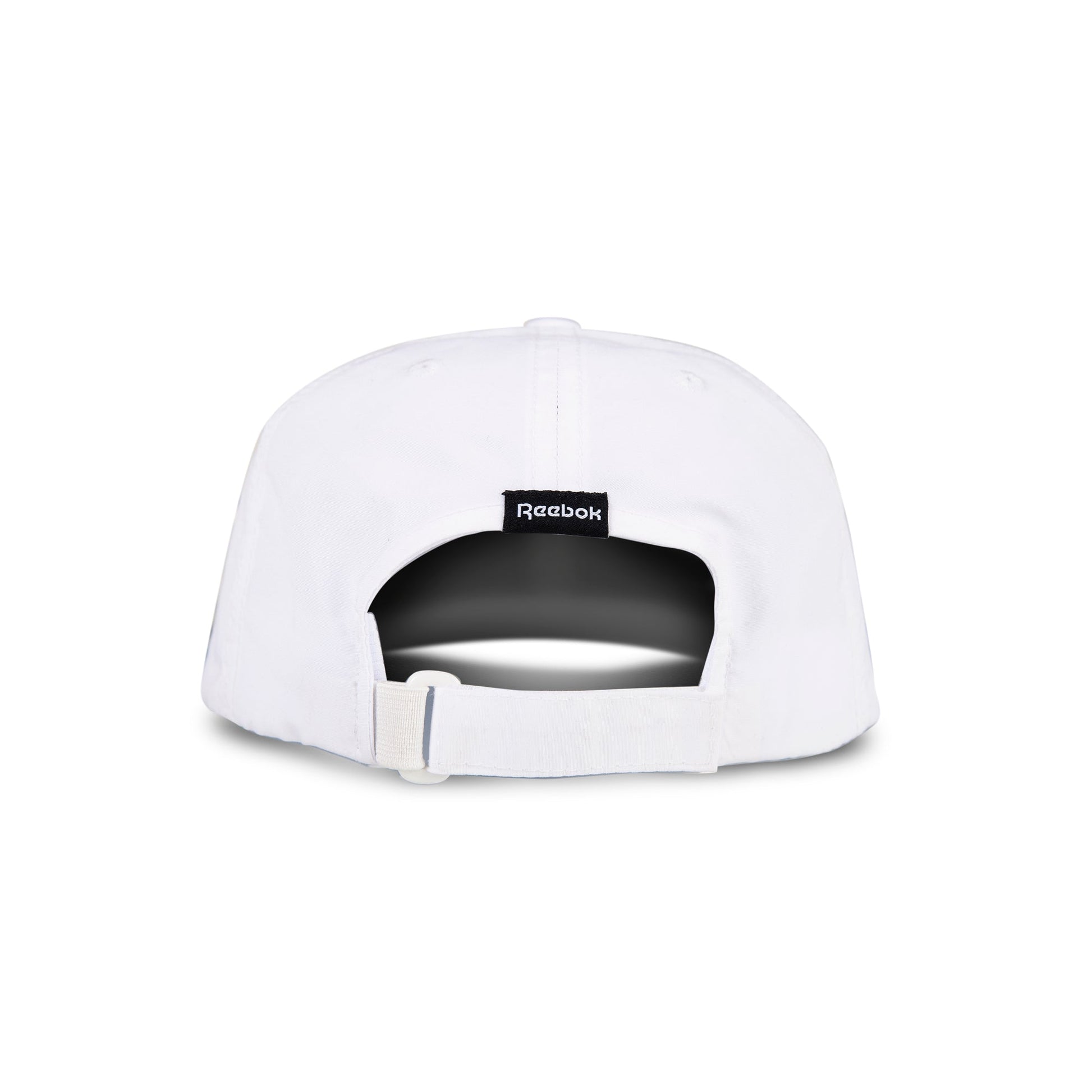 The Reebok Flow Cap in white is shown from the back, with an adjustable fabric strap and buckle, a black Reebok logo tag above the opening, and a moisture-wicking sweatband for comfort.